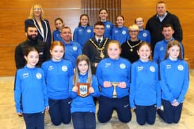 Causeway Coast and Glens Mayor Councillor Ciarán McQuillan and Deputy Mayor Councillor Tanya Stirling pictured with Mechelle Leeming and Alan McIntyre, Ballymoney United Youth Development Officers, and the Ballymoney Girls Youth Academy U13’s at a reception held to celebrate their recent success in local football. CREDIT CCGBC