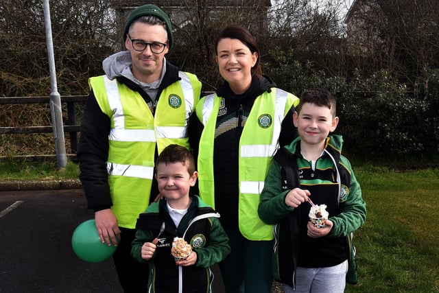 Ciaran and Danielle Marshall who were marshals for the St Paul's GAC St Pat's day parade pictured with their children, LughAidh (8) and Riaghan (4). LM12-204.