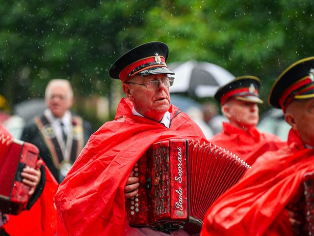 Well wrapped up for the rain.