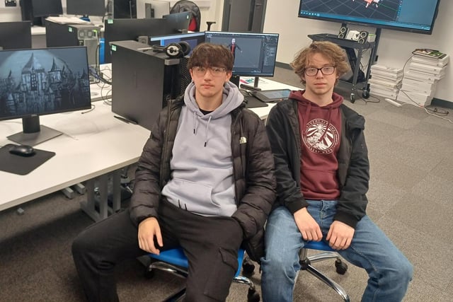 Northern Regional College Level 3 Games & Animation students, Rhys Goligher and Josh Kneeland, showcasing their work to prospective students.