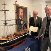Councillor Thomas Beckett, Chair of LCCC’s Communities and Wellbeing and Lisburn-based modeller, Werner Geyer at the exhibition. Pic credit: LCCC