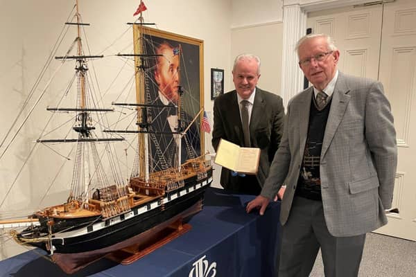 Councillor Thomas Beckett, Chair of LCCC’s Communities and Wellbeing and Lisburn-based modeller, Werner Geyer at the exhibition. Pic credit: LCCC