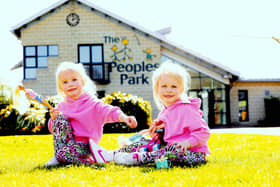 Four-year-old twins Caoimhe and Caitlin McErlean from Portglenone in Co Antrim enjoy a day out in the sunshine at the People’s Park, Ballymena. Picture: Stephen Davison/Pacemaker Press