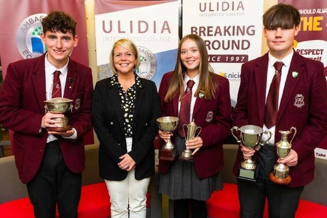 Ethan winner of The Andrew Jackson Bowl for Outstanding Contributions in Humanities, Kristian winner of The Ernest Walton Trophy and The Endeavour Cup and Rebecca winner of The William Rowan Hamilton Award For Outstanding Contributions in Mathematics and The Ulidia Cup. Pictured with Vice Principal Mrs Campbell.