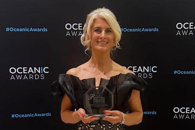 Marian McClean with her award.