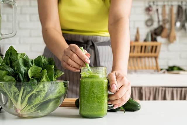 A woman makes a green smoothie.  The new superfood Macha's Orchard powder can be used in smoothies or sprinkled on porridge. Developed by Richmount Rural Community Association near Portadown, Co Armagh, the powder is professed to have beneficial health qualities.
