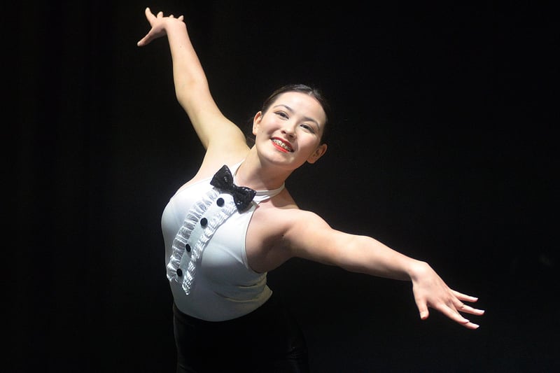 Cara Hutchinson taps her way across the Portadown Town Hall stage in the Tap Solo 13-14 Years class at Portadown Dance Festival. PT17-253.