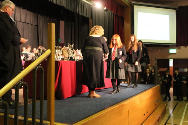 Pupils receiving awards in the assembly hall.