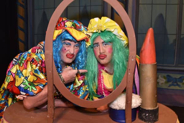 Nothing like a dame...Eddie Drury, left, and Jason Price who play the 'Ugly Sisters' in the Gateway Theatre Group 40th anniversary pantomime, 'Cinderella'. PT01-233.