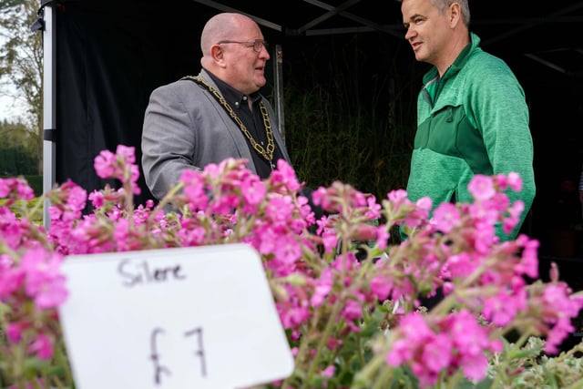Mayor of Antrim and Newtownabbey, Councillor Neil Kelly with Paul Duggan from Sprout during the Spring Plant Fair in Antrim Castle Gardens.