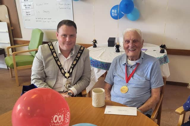 Mayor of Antrim and Newtownabbey, Cllr Mark Cooper, wished Mr Robinson a happy birthday,