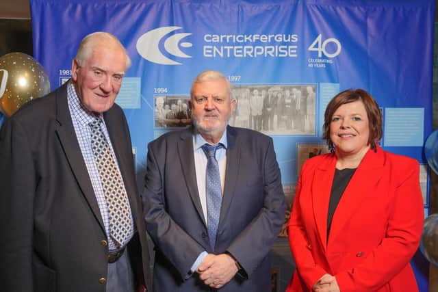David McIlhagger, vice chairman; Bill Adamson, chairman and Kelli McRoberts, manager, at Carrickfergus Enterprise’s 40th anniversary dinner.