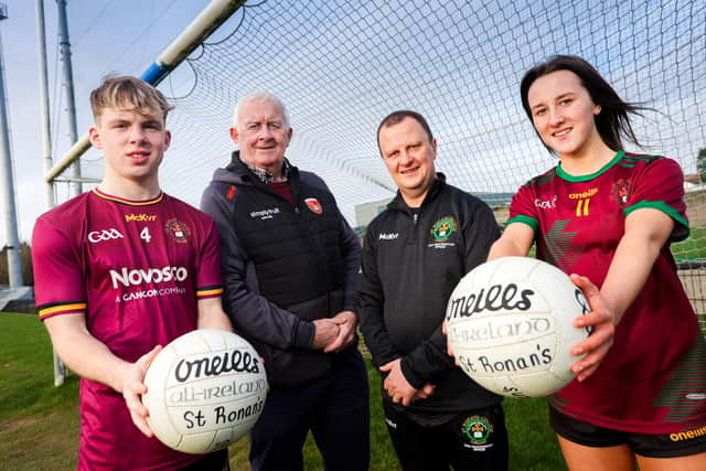 Pictured with St Ronan’s College students Oisin Moore and Evie McCaffrey are Jimmy Smyth, President, Armagh GAA (second left) and Kevin Curran, GAA Participation Officer. Picture: Brian Thompson