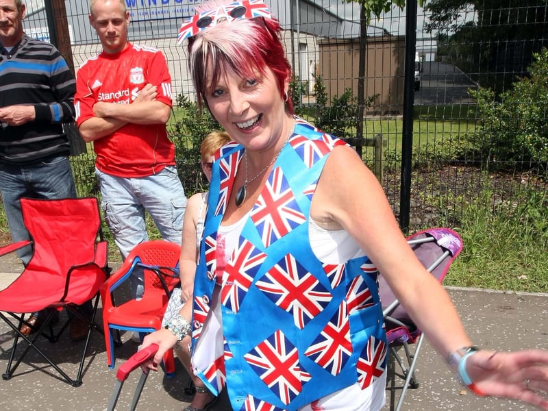 Debbie Smith was ready for all weather during the Twelfth celebrations in Antrim. NT29-015FP
