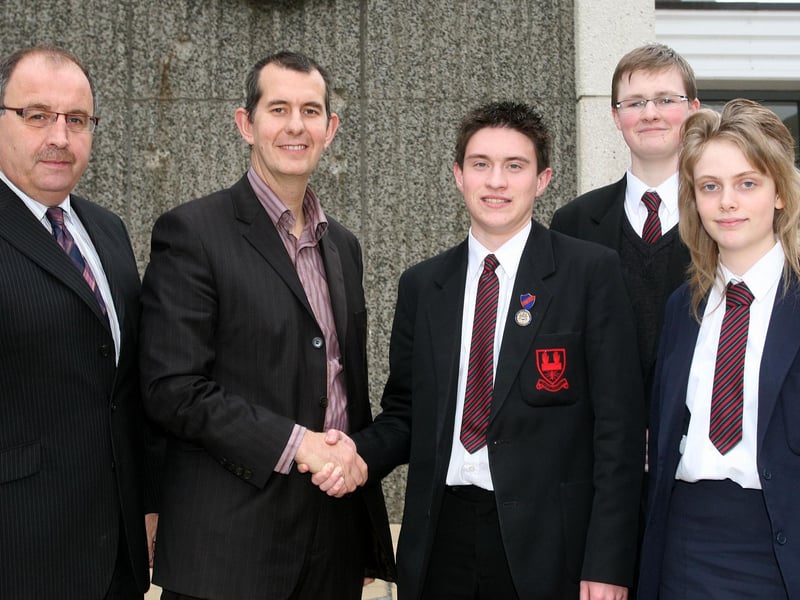Gary Walker welcomes Edwin Poots to Ballymena Academy for a meeting with the schools Economics and Politics society in 2007. Looking on are Sarah Lynn, Matthew Turtle and Mr. Ronnie Hassard (Principal). BT48-213AC