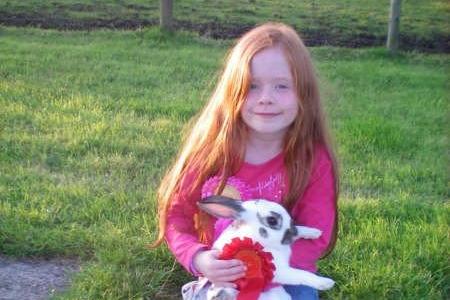 PRIZE PET....Jessica Jane with her prize winning rabbit that won first prize in the Garvagh Clydesdale Show. The pet rabbit took first prize for the second year in a row.

