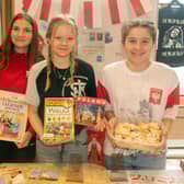 Showing off some Polish culture are from left, Aine Breslin, Hannah Chodaowska, Tosia Augustyniak and Lena Swiderska. PT18-206.