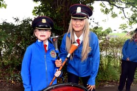 Eliza Compson (7) and Kaia Gowing who are leaders of Mullabrack Accordion Band pictured before the band's 40th anniversary parade in Markethill on Friday night. PT22-200.