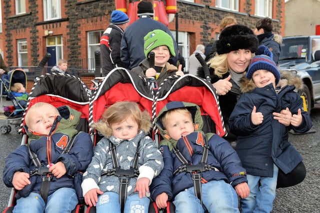 Ruth Annear with triplets Fionntan, Meabh and Aodhin along with Lucas and James pictured at the 2017 Victorian Street Fair in Whitehead.