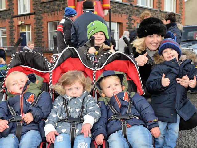 Ruth Annear with triplets Fionntan, Meabh and Aodhin along with Lucas and James pictured at the 2017 Victorian Street Fair in Whitehead.
