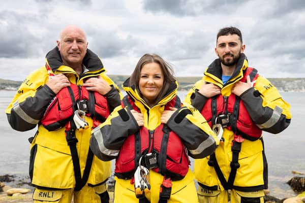 Larne RNLI volunteer crew members Frank Healy, Sam Agnew and Jack Healy.  Photo by: Nathan Williams