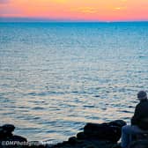 Do you recognise the couple who were captured in this fantastic shot of a stunning Portrush sunset by DMPhotography NI? Credit DMPhotography NI