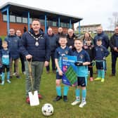 Local community groups, 18th Newtownabbey FC and and the Mayor of Antrim and Newtownabbey, Councillor Mark Cooper, at the sod-cutting of the new 3G pitch at Monkstown. Picture: Antrim and Newtownabbey Borough Council.