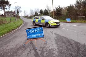 Police at the Ballynahonemore Road in Armagh on Sunday following the collision. Picture: Pacemaker