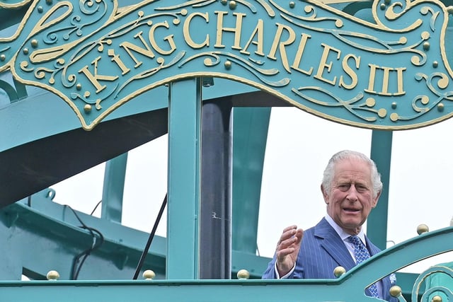 King Charles enjoys the view from the new coronation garden. Picture: Colm Lenaghan/Pacemaker
