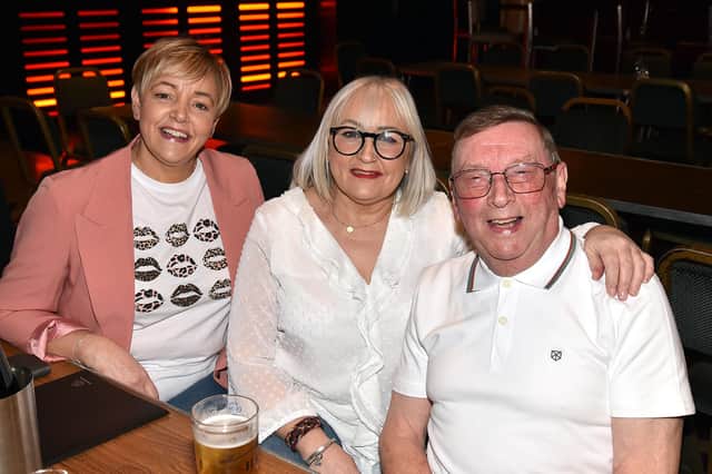 Enjoying the Lismore Comprehensive School 50th anniversary concert in the Ashburn Hotel are from left, Maureen Devlin, Cate Mulholland and Daniel McGibbon. LM06-200