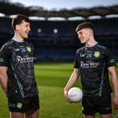 Derry star Shane McGuigan with U15 O'Tooles footballer Cillian Hanlon at Croke Park in advance of the John West Féile Peile na nÓg finals 2026. Photo by David Fitzgerald/Sportsfile.