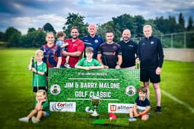 Launching the countdown to the inaugural Jim and Barry Malone Golf Classic on Saturday 23rd August 2025 at Ashfield Golf Course, Cullyhanna are l-r Ruby Murphy, St Killian’s GAC and Armagh Minors, Patrick and Rory Malone, Corlatt Construction Services Ltd, Kieran Shields, Chairman, St Killians GAC and Tullyherron Farm Feeds, Michael Malone, Walltech Drylining and Plastering, Shane Malone, Malcor Fitout Ltd, Brian McKeown, Treasurer, St Killian’s GAC. (Front) Logan, Ethan, Zola and Reilly Malone.
