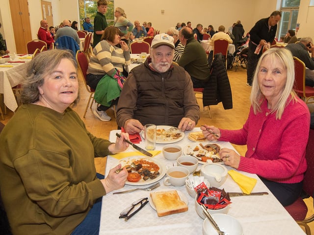 Tucking in to their big fry-up are from left, Angela Mawhinney, Michael Anderson and Jennifer Anderson.