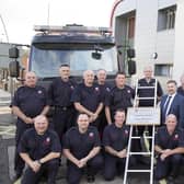Health Minister Robin Swann with On-Call Firefighters, Larne Fire Station.