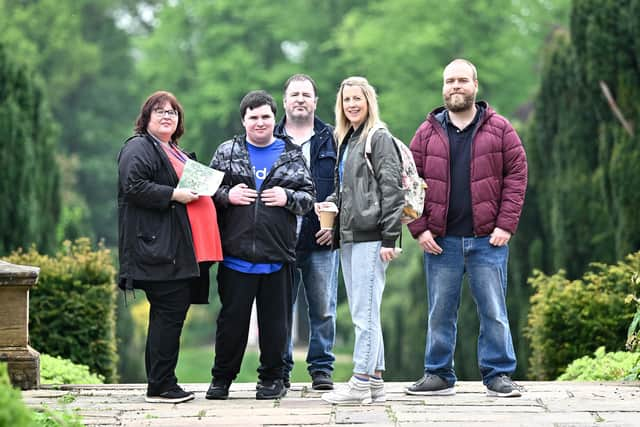 Autism NI Lisburn Support Group Secretary Paula McClinton and her family, along with volunteer Alana Carlisle and her partner.