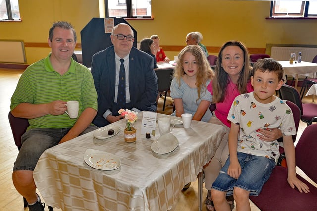 Taking time out for a photo at the Thomas Street Methodist Youth Fellowship coffee morning are from left, Keith Wilson, Steven Wright, Darcy Proctor, mum, Clare and brother George. PT26-209.