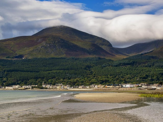 Situated in County Down, Newcastle offers the Mourne Mountains as a backdrop with the stunning sea view also available when facing the other way.
For keen hikers, the nearby Slieve Donard is a fab choice, so bring your boots and see how far you can make it up Northern Ireland’s highest mountain.