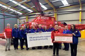 FROM LEFT: Helen Keating (Air Ambulance NI), Tesco Community Champions Caroline (Bangor), Ann (Antrim), Jackie (Ballymoney), Edel (Lurgan) and Anne (Carrickfergus), David Leckey (Air Ambulance NI), Tesco Community Champions Lesley (Antrim), Robert (Newtownbreda) and Donna (Yorkgate), Alison Lecky (Air Ambulance NI), Heather Theunissen (Air Ambulance NI) and Tesco Community Champion Kym (Crumlin). Credit Air Ambulance NI