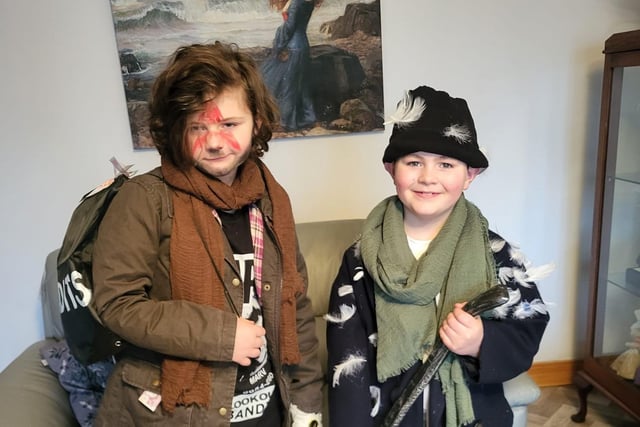 Isaac and Francis dressed as The Wet Bandits from Home Alone.