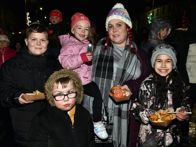 Enjoying some of the seasonal fare on offer at the Lurgan switch-on. LM47-209.
