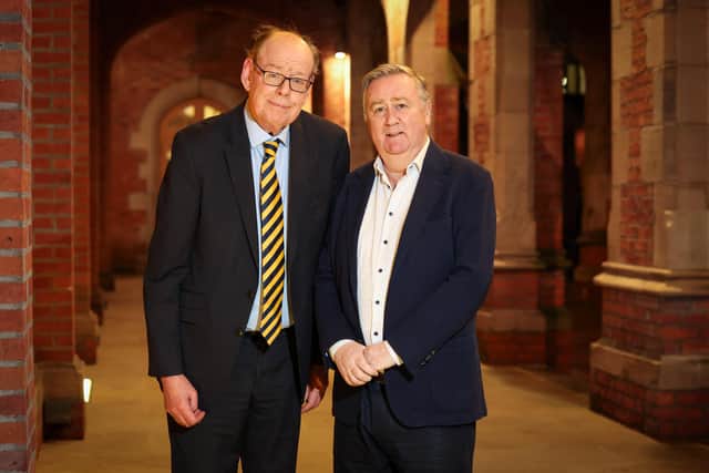 Stephen Grimason (right) and Ken Reid were presented with Chancellor's Medals by Queen's University Belfast in January 2024.  Picture: Matt Mackey / PressEye