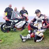 Bill Kennedy, Trevor Kane and William Munnis, pictured with motorcycle racer, Jeremy McWilliams