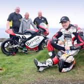 Bill Kennedy, Trevor Kane and William Munnis, pictured with motorcycle racer, Jeremy McWilliams