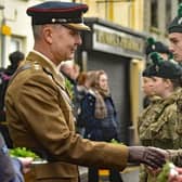 Army Cadet Corps members are presented with shamrock by Lt Col Cyril Stevenson during the 2023 parade. Picture: Tony Hendron