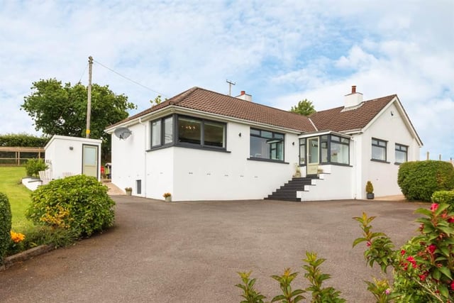 The detached family bungalow enjoys an elevated site with far-reaching views over open countryside.