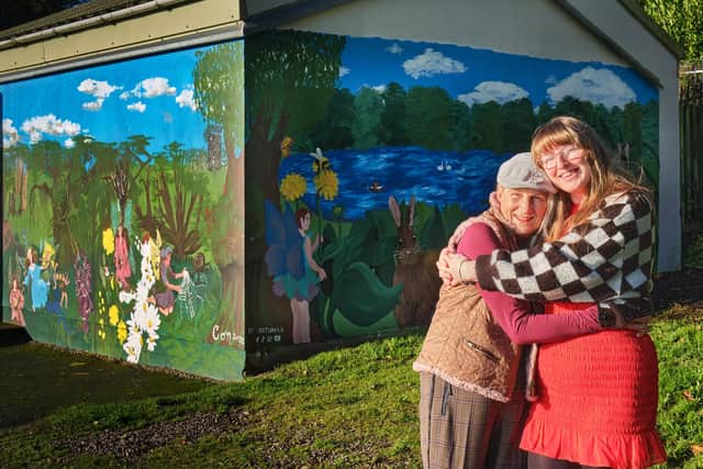 Mother and daughter team, Pat and Elizabeth England, who have completed a colourful new mural to brighten up a dark corner of Dungannon Park.