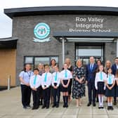 Education Minister Paul Givan with staff and pupils. Included are Mrs. Julie McDonagh, principal, and Mr. Ryan Brolly, chairman, Board of Governors. Credit Lorcan Doherty