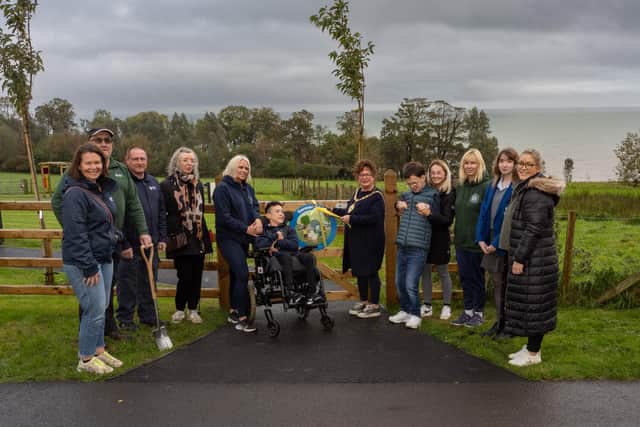 In attendance during the official opening of the new sensory area at Carnfunnock Country Park were MEA Mayor, Ald Geraldine Mulvenna; Cllr Maeve Donnelly, represetnatives of the Mae Murray Foundation, and MEA officers Tara McAleese (Principal Parks Officer); Lindsay Houston (Parks Dev Manager); Kerry Fokkens (Principal Parks Duty Officer); Chris Wood (Woodland Engagement Officer), and Stephen Dines (Playground Inspector). Photo: Chris Neely