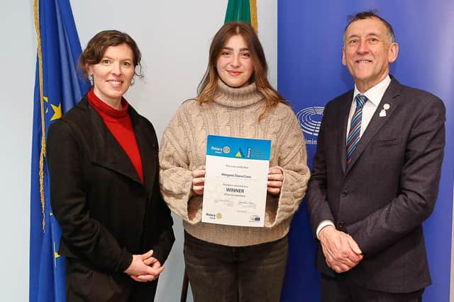 Margaret Cross receiving her Rotary Youth Leadership Development Competition award from Fionnuala Croker, acting head of office, the European Parliament Office in Dublin and Seamus Parle, District Governor of Rotary Ireland, at an event at Europe House in Dublin recently. Photo: Stephen McCracken Photography