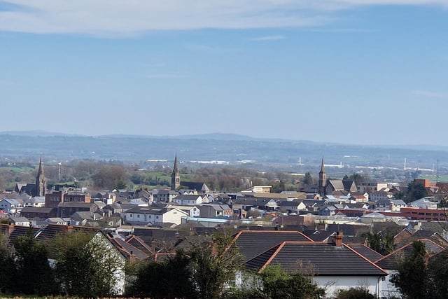 The three spires - some locals refer to Magherafelt as 'the three spires', meaning the three church spires (St Swithin's Parish, Church of Our Lady of the Assumption, and First Presbyterian) which are clearly visible in the skyline when approaching the town, regardless from which direction you come.  They are particularly eye catching  in the early morning when there's a low lying mist and the sun slow rises behind them. I know I'm home when I see the three spires poking up through the trees in the distance.
